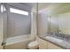 Bathroom with subway tile shower and granite vanity top at 1100 Loch Linnhe Ct, New Smyrna Beach, FL 32168