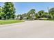 Sugar Mill community entrance showcasing the manicured landscaping and access point at 1100 Loch Linnhe Ct, New Smyrna Beach, FL 32168