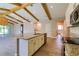 Kitchen island featuring granite countertops, stainless steel appliances and an open floor plan at 1100 Loch Linnhe Ct, New Smyrna Beach, FL 32168