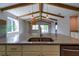 Kitchen island featuring a stainless steel sink and granite countertop at 1100 Loch Linnhe Ct, New Smyrna Beach, FL 32168