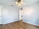 Bedroom featuring a neutral wall color, hardwood floors, a ceiling fan, and a closet at 1175 Margina Ave, Daytona Beach, FL 32114