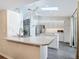 Bright kitchen featuring sleek appliances, ample countertop space, and open access to the living spaces at 1175 Margina Ave, Daytona Beach, FL 32114