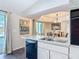 Kitchen with view to the pool and formal dining room at 1175 Margina Ave, Daytona Beach, FL 32114