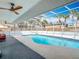 Large screened-in pool area with palm trees at 1175 Margina Ave, Daytona Beach, FL 32114