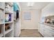 Laundry room featuring custom cabinets and countertop space at 1240 Wayne Ave, New Smyrna Beach, FL 32168