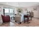 Cozy living room showcasing modern decor, neutral tones, and wood-look flooring at 1240 Wayne Ave, New Smyrna Beach, FL 32168