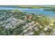 Scenic aerial shot of the property, highlighting its location in a tranquil riverside community at 128 Dixwood Ave, Edgewater, FL 32132