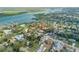 Expansive aerial view showcasing the property's proximity to the river and surrounding neighborhood at 128 Dixwood Ave, Edgewater, FL 32132