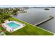 Community pool area includes ample seating and grilling space next to the Tampa Bay waterfront at 144 S Halifax Ave # 26, Daytona Beach, FL 32118