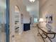 Inviting foyer with arched doorways and tile flooring leads to the living areas at 1502 Areca Palm Dr, Port Orange, FL 32128