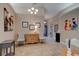 Inviting foyer with tile flooring, neutral walls, decorative lighting, and tasteful furnishings creates a warm welcome at 1502 Areca Palm Dr, Port Orange, FL 32128