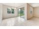 Bright dining room with natural light and sliding glass doors to the backyard at 1731 Red Rock Rd, New Smyrna Beach, FL 32168