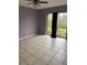 The bedroom offers outdoor views through the sliding glass door at 1774 Concert Rd, Deltona, FL 32738