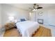 Well-lit bedroom featuring neutral colors, wood accents, and a ceiling fan at 18 Silk Oaks Dr, Ormond Beach, FL 32176