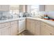 Kitchen counter with stainless steel appliances, ample counter space, and light wood cabinets at 18 Silk Oaks Dr, Ormond Beach, FL 32176