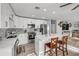 Bright kitchen featuring stainless steel appliances, a large center island, and ample counter space at 1855 Needle Palm Dr, Edgewater, FL 32141