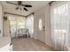 Inviting entryway with tile floors, lace curtains, and a bright, welcoming atmosphere at 254 Tanner St, New Smyrna Beach, FL 32168