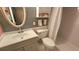 Bathroom with a classic vanity, commode and shower at 26 Birdie Dr, New Smyrna Beach, FL 32168