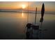 Sunrise view of the beach with fishing gear at 26 Birdie Dr, New Smyrna Beach, FL 32168