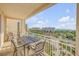 Enjoy ocean views from the balcony with a dining set, perfect for relaxing and entertaining in style at 263 Minorca Beach Way # 801, New Smyrna Beach, FL 32169