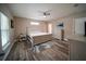 Main bedroom with a neutral palette, ceiling fan, and light colored wood furniture at 2995 Ragis Rd, Edgewater, FL 32132