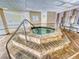 Spa with whirlpool and tile flooring at 3 Oceans West Boulevard # 3B1, Daytona Beach Shores, FL 32118