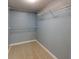 Walk-in closet features ample shelving at 3 Oceans West Boulevard # 3B1, Daytona Beach Shores, FL 32118