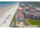 Beautiful aerial view of a beachfront property near the ocean and beach access at 3001 S Atlantic Ave # 204, New Smyrna Beach, FL 32169