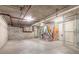 View of the basement storage area with caged-off storage and exposed piping at 3001 S Atlantic Ave # 204, New Smyrna Beach, FL 32169