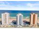 Aerial shot showcasing beachfront condos and panoramic ocean views on a sunny day at 3047 S Atlantic Ave # B050, Daytona Beach, FL 32118