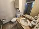 Bathroom featuring a sink with a wood vanity and tiled floors at 309 Sea Hawk Ct, Edgewater, FL 32141