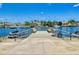 Community boat dock featuring benches and stainless steel wash station at 315 N Causeway # 405, New Smyrna Beach, FL 32169