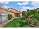 Private backyard featuring lush green lawn and mature tropical landscaping for relaxation at 3368 Tuscano Ne Ave, New Smyrna Beach, FL 32168