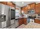 Beautiful kitchen featuring stainless steel appliances, granite countertops, and modern fixtures at 3368 Tuscano Ne Ave, New Smyrna Beach, FL 32168