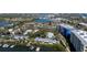 Scenic aerial view of the townhouses near the water, showcasing the surrounding landscape and boat docks at 43 Jacaranda Cay Ct # 430, New Smyrna Beach, FL 32169