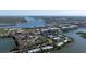 An aerial view shows the property's location with river and bridge views at 43 Jacaranda Cay Ct # 430, New Smyrna Beach, FL 32169