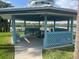 Charming community gazebo with picnic tables offering a scenic view of the waterfront at 43 Jacaranda Cay Ct # 430, New Smyrna Beach, FL 32169