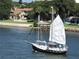 Waterfront house boasting views of passing sailboats and private dock with a covered gazebo at 45 Sandra Cir, New Smyrna Beach, FL 32168