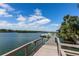 Scenic waterfront with a rustic dock, perfect for boating and enjoying nature at 47 Jacaranda Cay Ct # 470, New Smyrna Beach, FL 32169