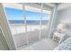 Enjoy this ocean view from the balcony, accessible from the bedroom, with sliding glass doors and tile flooring at 4767 S Atlantic Ave # 404, Ponce Inlet, FL 32127