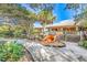 Exterior of welcome center with inviting benches and decorative seashell statue at 4767 S Atlantic Ave # 404, Ponce Inlet, FL 32127