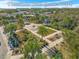 Aerial view of Timucuan Oaks Garden Park with gazebos and greenery at 4767 S Atlantic Ave # 404, Ponce Inlet, FL 32127