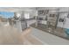 Open concept kitchen with granite countertops, stainless steel appliances, and views at 4767 S Atlantic Ave # 404, Ponce Inlet, FL 32127