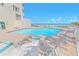 Enjoy the ocean view from the sparkling pool, surrounded by comfortable lounge chairs at 4767 S Atlantic Ave # 404, Ponce Inlet, FL 32127