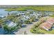 Aerial view of the community with lush landscaping and waterways at 49 Jacaranda Cay Ct # 49, New Smyrna Beach, FL 32169