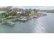 Beautiful waterfront property with multiple docks, offering ample space for boating and enjoying the waterfront lifestyle at 49 Jacaranda Cay Ct # 49, New Smyrna Beach, FL 32169