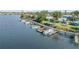 Waterfront homes feature private docks, manicured lawns, and convenient kayak storage for enjoying the water at 49 Jacaranda Cay Ct # 49, New Smyrna Beach, FL 32169