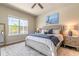 Bedroom featuring a plush bed, wood floors, and an abundance of natural light at 512 Romdini St, New Smyrna Beach, FL 32168