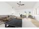 Sleek living room with a contemporary ceiling fan, minimalist decor, and plenty of open space at 5431 Landis Ave, Port Orange, FL 32127