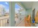 Spacious balcony with outdoor seating and ocean view at 604 S Atlantic Ave, New Smyrna Beach, FL 32169